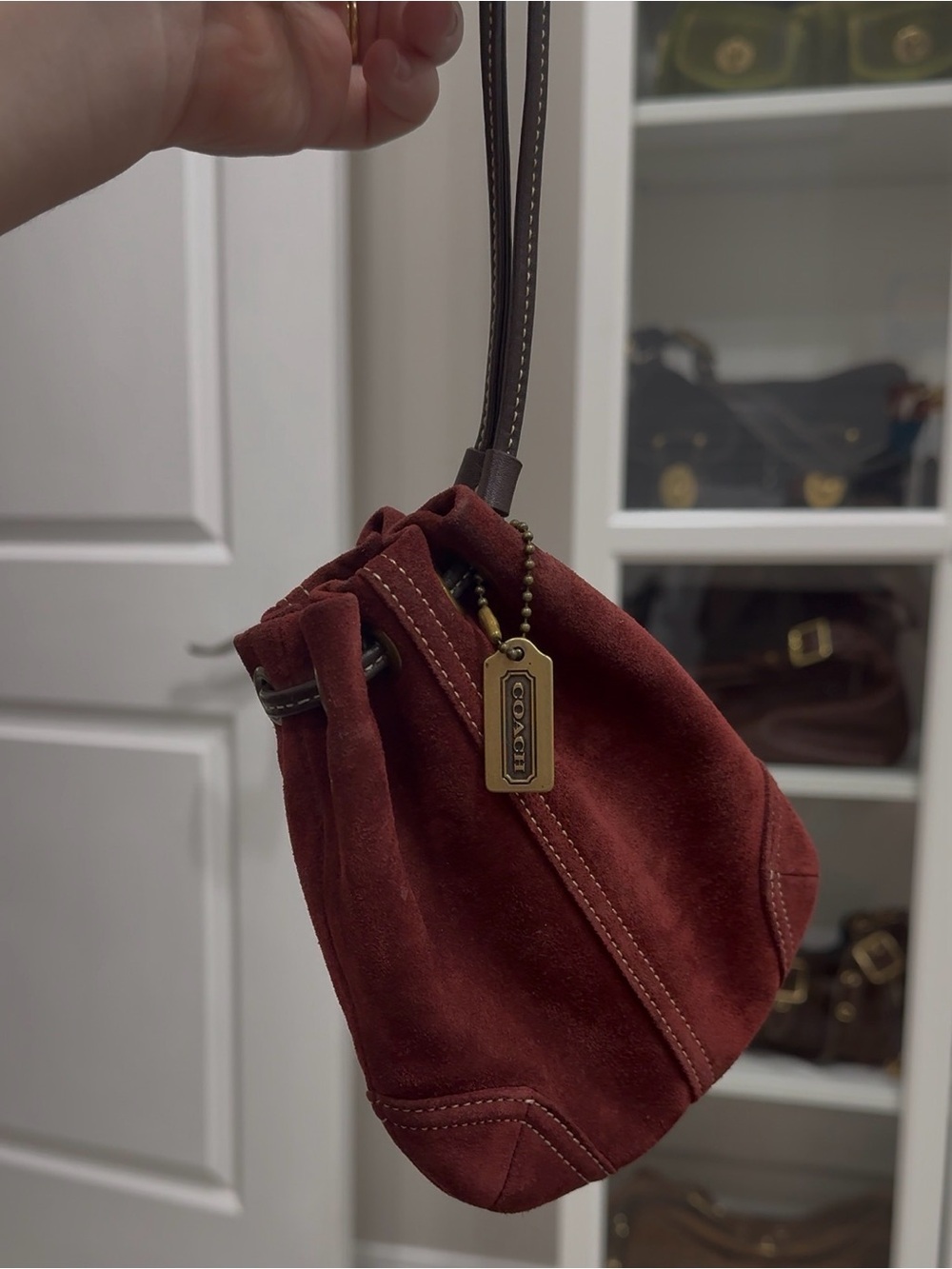 Coach Suede Drawstring Mini Bag in Burgundy